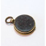 Gold and bloodstone locket, the back made from a Kruger Pond 1893, 21mm.