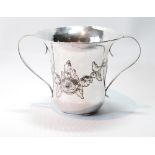 Silver porringer with embossed spray and loop handles, probably 1755, 3½oz.