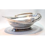 Silver oval cake basket with engraved pierced and pin struck bands, reeded handle, edge and foot,