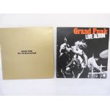 Two Grand Funk Railroad LP's to include Live Album and We're An American Band.