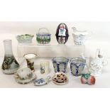 Small collection of miniature pottery & porcelain items including two floral encrusted baskets,