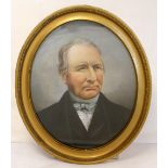 Victorian overpainted photograph of a Victorian gentleman, 49cm x 39cm (oval).