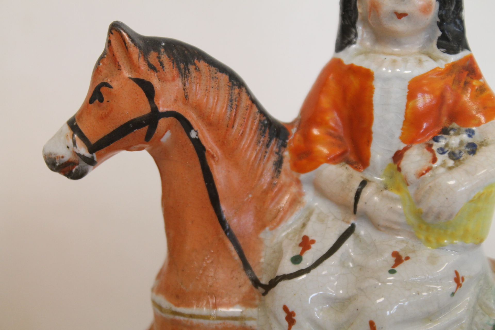 19th century Staffordshire figure of a young girl with basket of flowers riding sidesaddle, 19. - Image 4 of 10