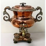 Large Victorian copper tea samovar by May & Morritt, Oxford & London, with twin dolphin handles,