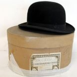 Bennetts of London black bowler hat "The Conforma", size 7 1/8, in original box.