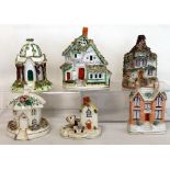 Collection of six 19th century & later pottery cottages,