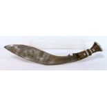 Kukri knife with white metal mounted hardwood handle, stamped "Guaranteed best steel",