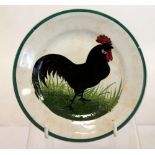 Small Wemyss circular dish decorated with a black cockerel, impressed mark,