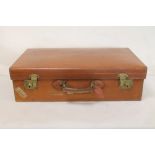 Late 19th/early 20th century Harrods brown leather suitcase with impressed name G. W.