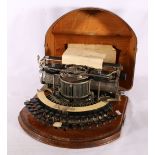 Hammond of New York skeleton typewriter in oak case CONDITION REPORT: Most of the