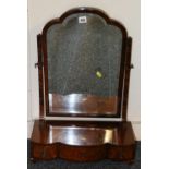 Birdseye walnut swing dressing glass with three frieze drawers on bracket supports,