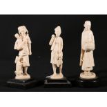 Three early 20th Century Burmese or Indian ivory figures on wood bases, 10cm,