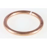 Rose gold bangle stamped SB and SLD 9ct,