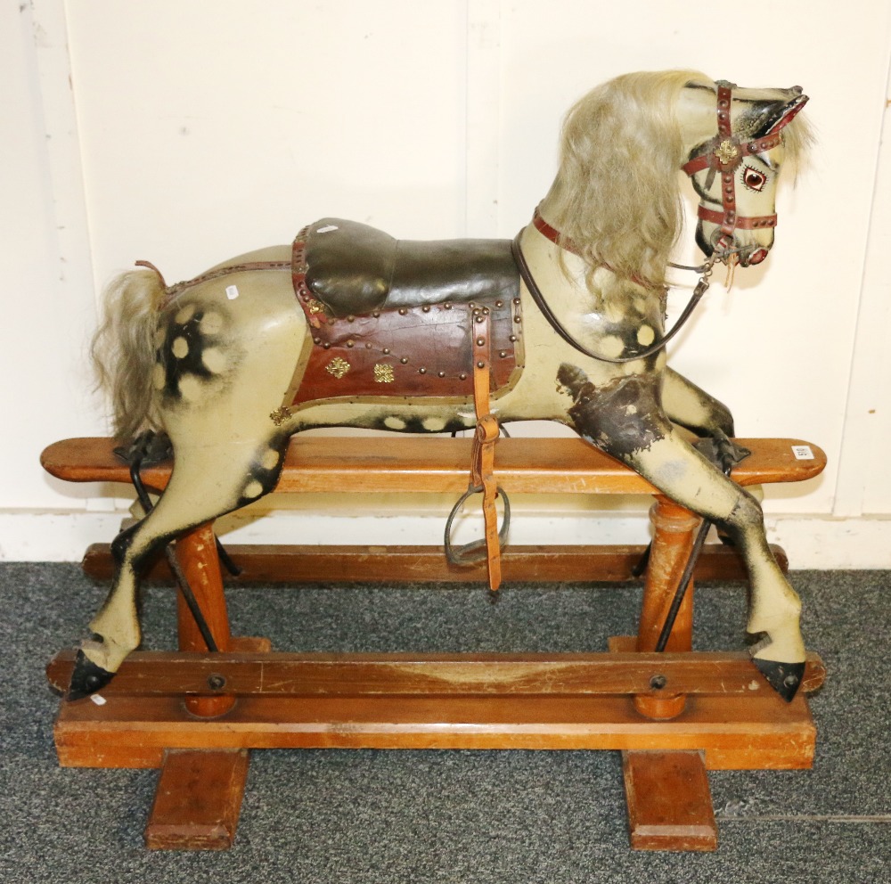 Victorian handpainted rocking horse with head tilted to right hand side,