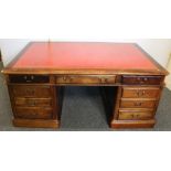 Mahogany partners desk, with insert red leather skiver, raised on twin pedestals, 123 x 183cm.