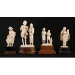 Four early 20th Century Indian carved ivory figures including two figure groups.