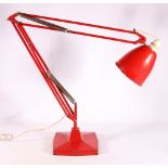 Herbert Terry anglepoise lamp with red body.