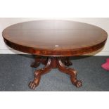 Regency mahogany circular tilt top table, the mahogany top with rosewood cross-banding,