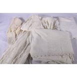 A three piece Christening robe with underskirt and bonnet, embroidered and with cutwork decoration,
