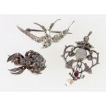 900 grade silver spider brooch set with white paste stones,