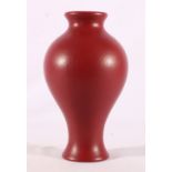 Royal Lancastrian vase of baluster form, with textured burgundy ground,