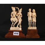 Pair of Indian early 20th Century carved ivory figure groups, two elderly beggars, 11.