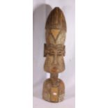 Tribal mask of elongated form, with applied decorative metal panels, inlaid with shells, 74cm,