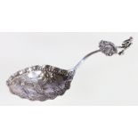 Continental silver caddy spoon with cherub finial, the bowl with water carrier,