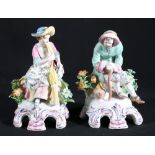 Pair of continental porcelain figures modelled as a male resting on a stick and a female with hay