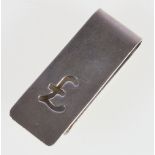 Silver money clip with pierced pound sign,