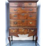 Early Georgian oak chest on stand, the upper section with two short and three long drawers,