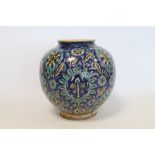 Large Isnik globular jar with stylised Persian floral motifs, indistinct printed mark, 30cm high.