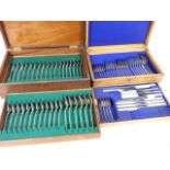 Two e.p. cutlery sets, one full set together with one partial set. Both in wooden cases.