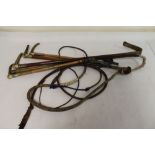 Five various late 19th century / early 20th century riding crops and whips.