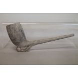 1920's giant clay pipe, the plain bowl on football and boot heel, 22cm long,