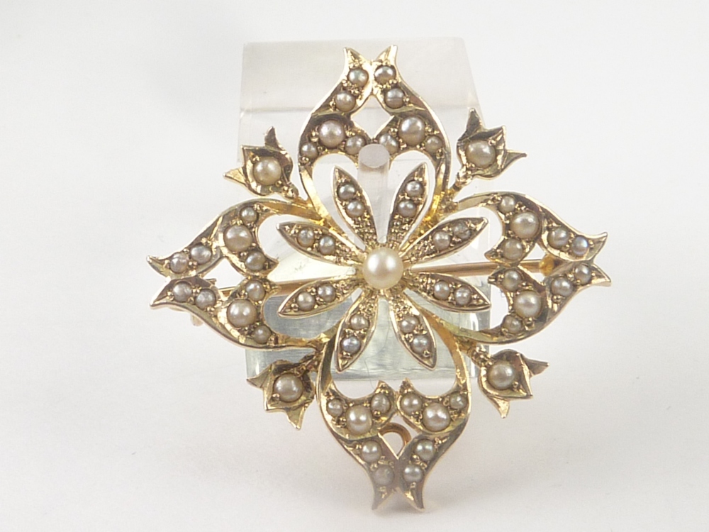 Victorian gold brooch pendant of square shape with flower centre, probably 15ct.