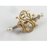 Victorian gold brooch with pierced monogram R.S.C. with two pearls.