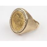 1/10 Krugerrand ring in 9ct gold, size 'M 1/2'. Condition Report. 7g.