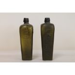 Two antique Dutch case gin bottles dredged from the Escravos River, Nigeria, one marked "E.