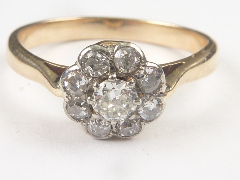 Edwardian diamond cluster ring with old cut brilliants. Size 'O 1/2'.