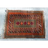 Small Persian rug with geometric panels and multiple borders. 120cm x 84cm.