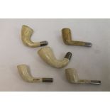 Five Victorian clay pipe heads with white metal bands by C.