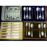 Two sets six silver tea spoons, another, with knop and six tea knives with pearl handles, all cased.