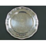Modern silver circular plate with shaped moulded and gadrooned edge, crested, 28cm.
