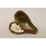 Late 19th century Meerschaum carved "Pine Cone in Hand" pipe with amber stem, as new, 11.