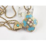 Victorian turquoise enamel locket with pearls and tiny ruby, on necklet with similar slide.