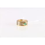 18ct yellow gold 'Pear' shaped emerald set buckle dress ring.