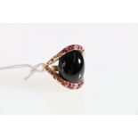 18ct yellow gold onyx, ruby and diamond ring.