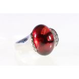 18ct white gold garnet and diamond set cabochon dress ring.