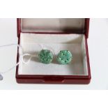 9ct white gold claw set carved jade button stud earrings.